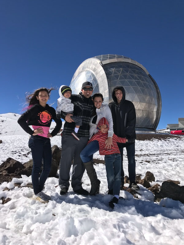 family photo atop Mauna Kea at the observatory